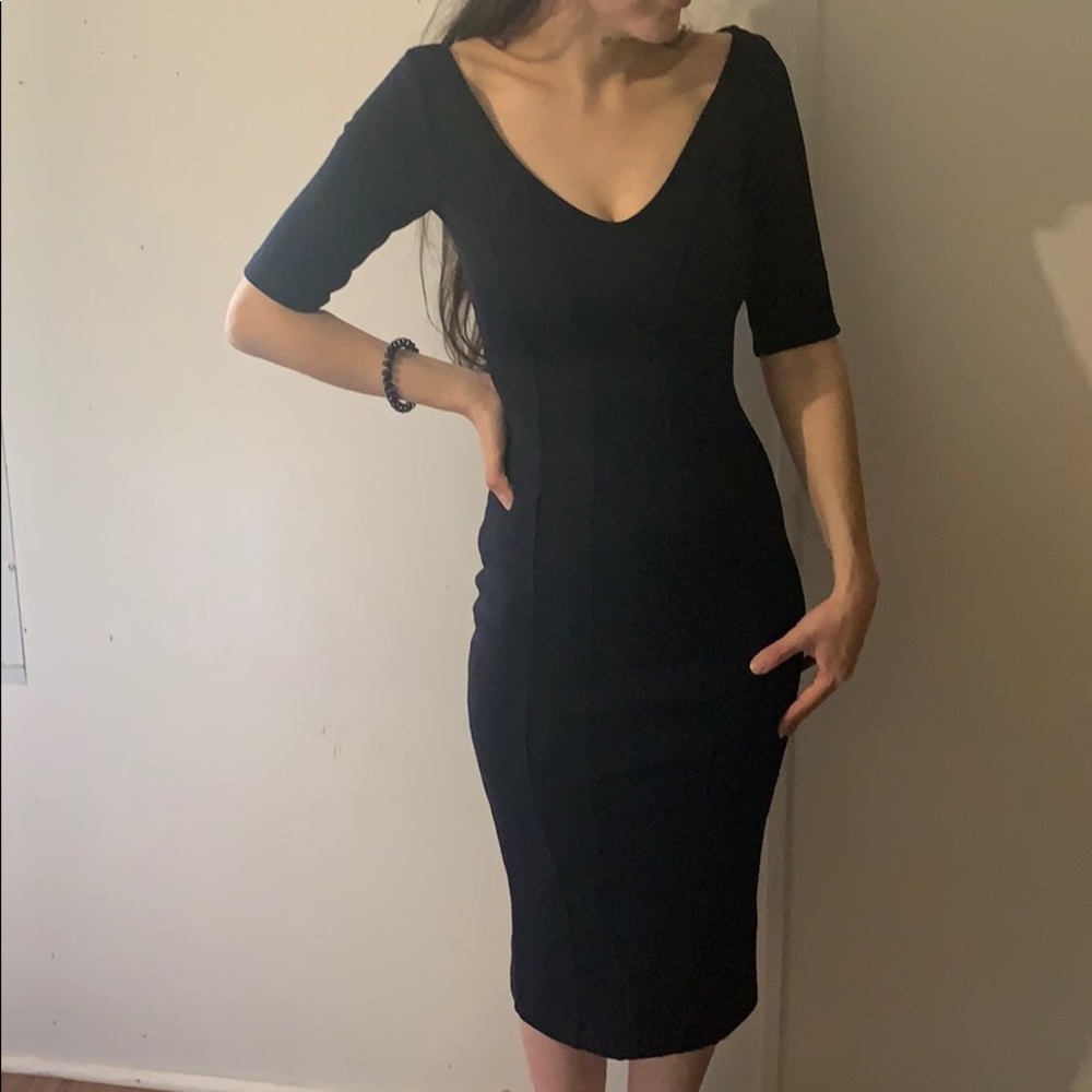 Black body hugging dress